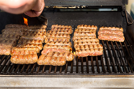 肉卷在烤架上食物美食气体火焰烹饪熏制专业网格乡村烧伤图片