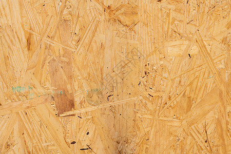 刨花板面板特写刨花板材料木板蓝色锯末控制板木工底层粒子木材图片