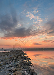 日落时盐湖的全景生态海岸天气途径支撑旅游绿色矿盐天空死海图片