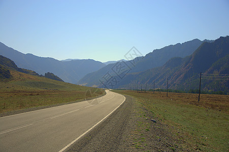 山间断裂的公路环绕超越地平线路线场景曲线旅游天空环形爬坡旅行横幅山脉图片