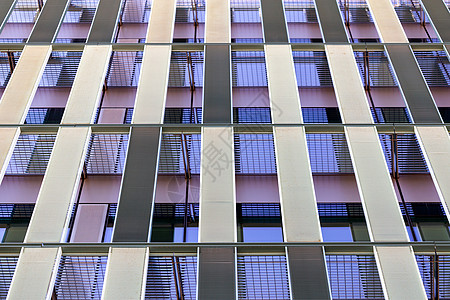 具有弯曲立面的现代建筑金属高楼建筑学城市窗户反射经济办公室财产金融图片