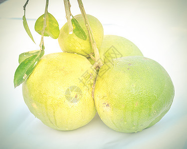 已过滤的亚洲波梅罗葡萄水果图象 白上与叶干隔绝团体柚子热带收成饮食植物食物小路橙子叶子图片