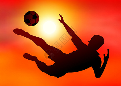 日落背景的足球选手图片