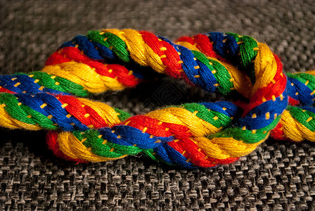 彩虹色的知识编织领带绳索彩虹蓝色鞋带白色黄色绿色乐趣图片