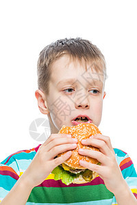 10岁男孩和有害但好吃的食物汉堡包图片