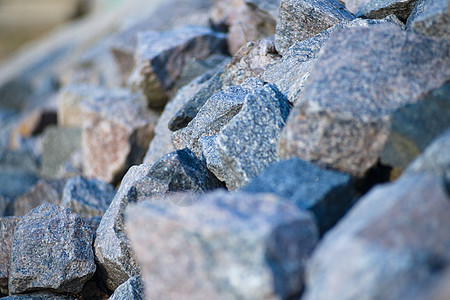 河岸上的一堆石头 堆积的石头地质学土地墙纸矿物岩石材料花岗岩黑色灰色卵石图片