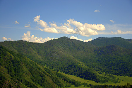 画像般的山丘长得草茂盛 形成山谷环境岩石爬坡风景晴天天空远足旅行丘陵顶峰图片