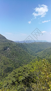 山爬坡风景薄雾住宅顶峰背景图片