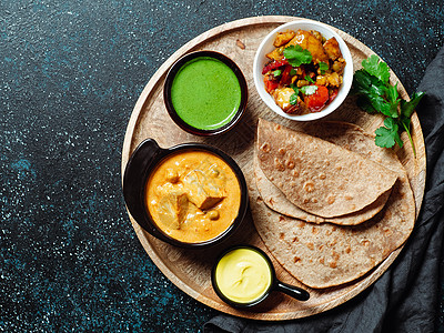 印度食品和印度烹饪盘 复制空间食谱高架煎饼餐厅框架盘子酱料横幅馅饼黄油图片