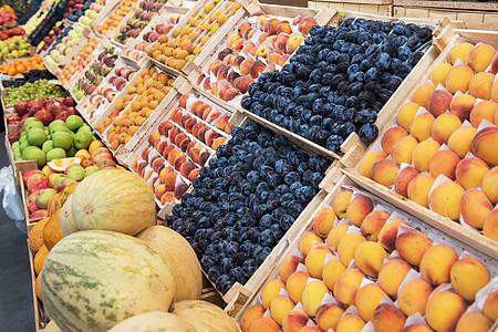 水果在市场上的摊分杂货店果汁店铺营养收成西瓜味道热带橙子生产图片