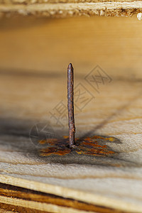生锈的钉子危险材料指甲风化螺丝宏观金属木材董事会乡村背景图片