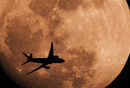 飞过月球的休光飞机月亮旅行航空公司航空喷气旅游环境天文学地平线飞行图片