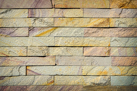 黄砖墙纹理背景风格地面石头房间乡村水泥岩石石工装饰石墙图片