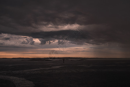 海洋的暴风云云景天气阳光海景危险日落风暴气候蓝色海岸线图片