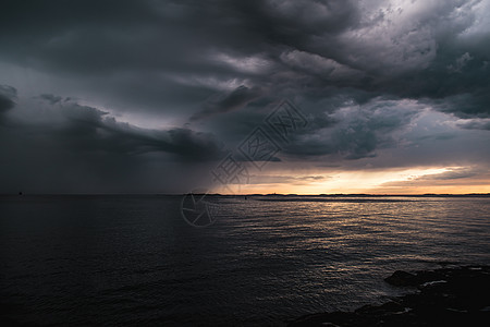 海洋的暴风云云景蓝色力量阳光海岸危险海岸线气候戏剧性日落图片