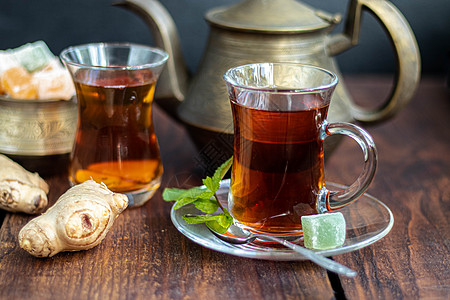 阿拉伯 东方茶加柠檬桌子咖啡水果食物液体茶壶玻璃黑色白色饮料图片