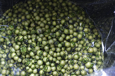 A 背景 泰国草药和天然布料染料的天然染料淋湿疾病软糖水果草本植物染色乌木药品叶子霉菌病图片