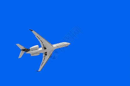天空中的白色飞机喷射客机速度方法起落架载体航空公司底架航班飞行图片