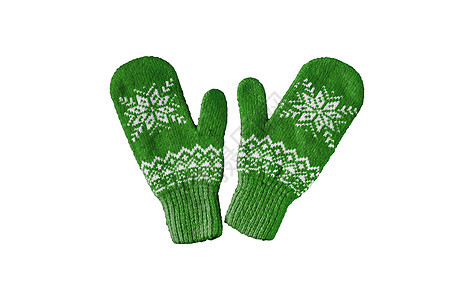 一对绿色编织的手套 与圣诞节模式隔绝手指织物球衣材料针织雪花服饰钩针孩子针织品图片