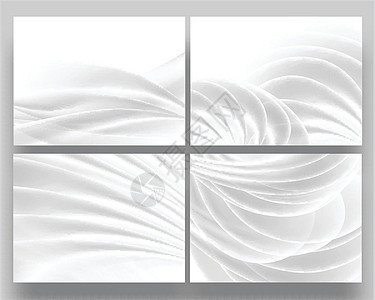 柔软的奶油色抽象背景 白色缎面漩涡图片