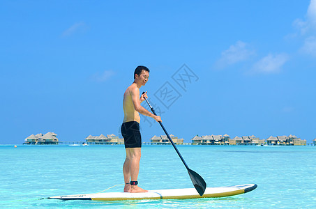 疾病岛的船板热带旅行天空娱乐海洋男人假期蓝色情调潜水图片