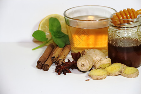 茶海姜薄荷柠檬和蜂蜜美食药品肉桂薄荷香料香气桌子杯子八角烹饪背景