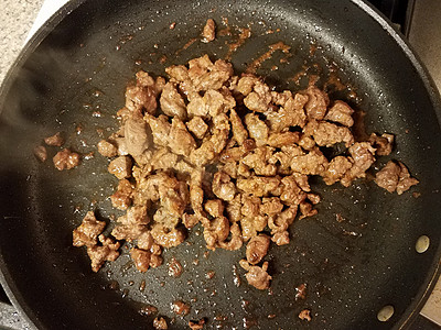 用烤锅煮地牛排牛肉午餐地面烹饪煎锅食物平底锅油炸图片