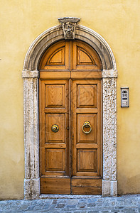 典型的意大利面孔有门 意大利房子入口建筑学古董建筑街道石头图片
