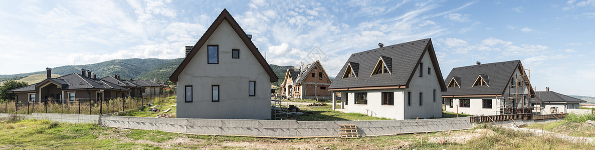 许多新房子 全景装修木工蓝色财产天空建筑住宅工业框架建筑学图片