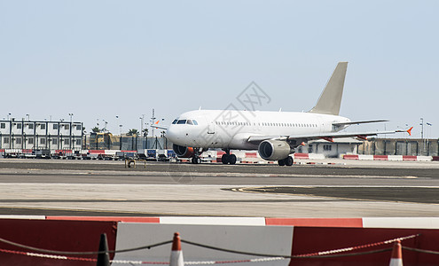 起飞前的飞机乘客游客运输航空公司商业航空跑道国际航班旅游图片