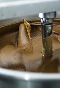 巧克力工厂混合巧克力机件工业漩涡面粉面包机器混合器棕色工厂面团技术背景