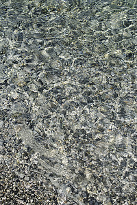 鹅卵石海滩岩石蓝色地平线海岸线海浪天空白色海岸石头假期图片