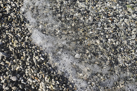 鹅卵石海滩石头支撑海洋海岸蓝色假期卵石海浪岩石白色图片