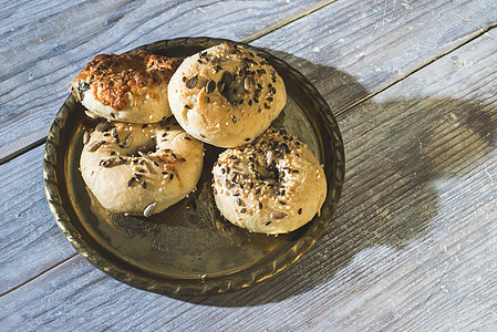 百吉饼芝麻圆形早餐食物包子健康面包白色棕色粮食图片