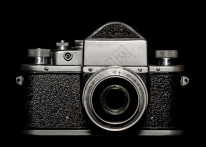 黑色背景切换黑背景的老旧相机镜头空白老相机技术镜片金属灰色背景图片