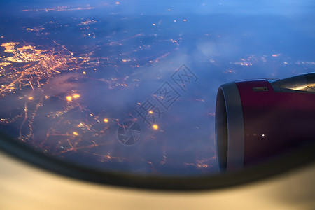 空中飞机夜视航空公司旅行蓝色运输白色喷射气氛翅膀窗户速度图片