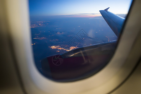 空中飞机夜视交通航空公司旅游天线城市窗户翅膀航空旅行商业图片