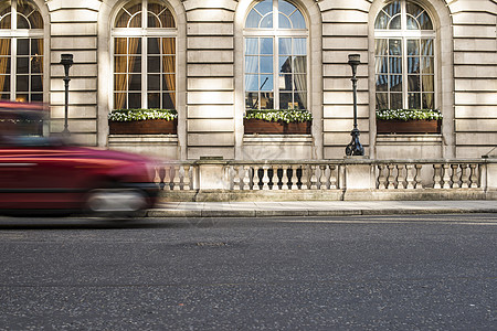 出租车在伦敦开动平移城市黄色驾驶汽车公共汽车市中心出租车司机运动运输图片