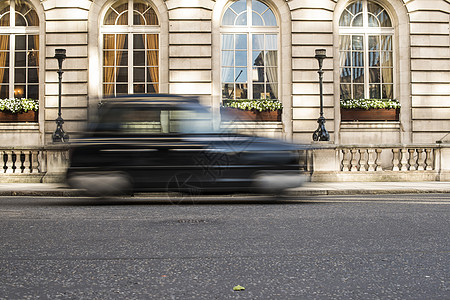 出租车在伦敦开动红色汽车街道公共汽车运动游客黄色吸引力平移运输图片