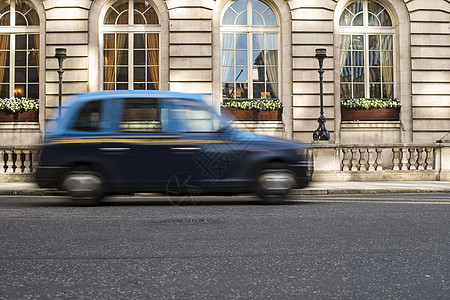出租车在伦敦开动运输城市运动市中心出租车司机红色吸引力驾驶汽车平移图片