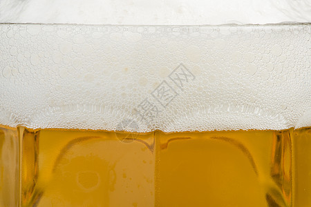 啤酒杯特写背景气泡宏观泡沫豪饮白色玻璃黄色草稿酒精液体图片