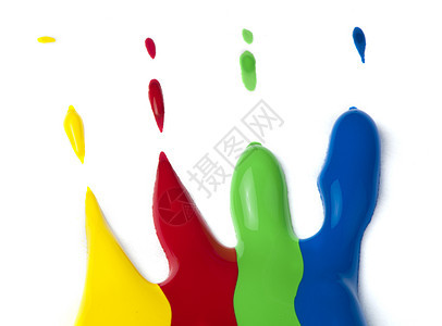 油漆涂在纸上 红绿蓝和黄色光谱颜料蓝色彩虹宏观液体教育绘画绿色管子图片