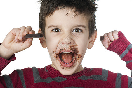 微笑的小男孩 吃巧克力吃巧克力童年美食小吃食物孩子味道男生甜点可可活力图片