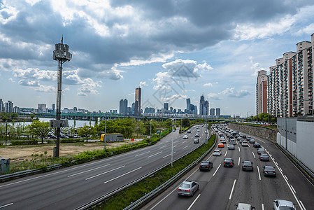 南韩首尔的交通流量步伐运动城市地标路口场景摩天大楼旅行铜雀速度背景图片