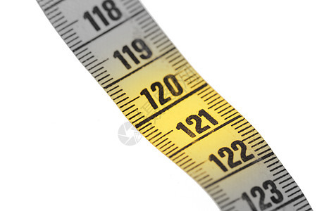 特写白色上隔离的黄色测量带  120损失裁缝带测量水平磁带卷尺尺寸数字剪裁饮食背景图片