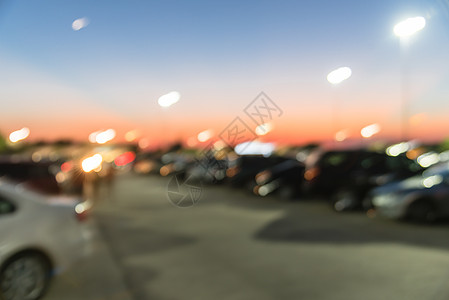 明日夕阳在得克萨斯州休斯敦市购物中心停车场背景市场建筑日落零售店面经济吸引力品牌奢华图片
