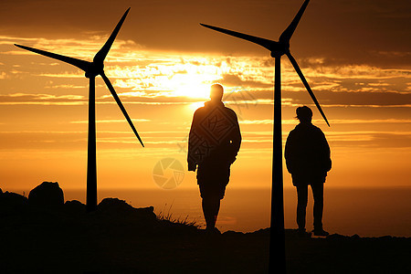 日落时的风力涡轮机植物环境生态天空活力发电机螺旋桨涡轮光伏背景图片