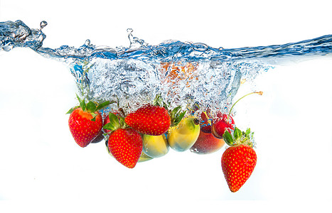 在水中降下果实运动溪流液体生物气泡飞溅食物饮食水果图片