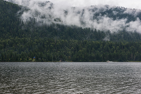 阿尔泰山区福吉特莱斯科耶湖反射天空岩石太阳绿树环境卫生保健全景海浪图片