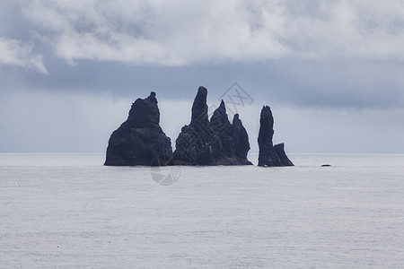 来自Dyrholaey的海堆海滩半岛海岸旅行编队海洋悬崖作用岩石支撑图片